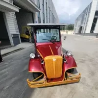 รถกอล์ฟไฟฟ้าคลาสสิก สีแดงทอง สำหรับใช้ในเขตอุตสาหกรรม